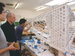 Michael Maltzan and colleagues work on a large-scale model.