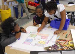 Students work together to complete plan drawing of site.